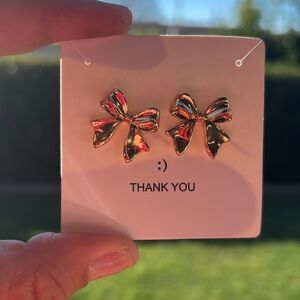Gold bow earrings - studs